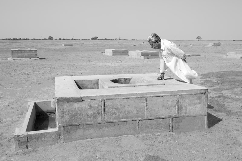 Chattar Singh Jam, the Water Wizard of Thar Desert, exploring the water table in a 'beri'in Viprasar in Jaisalmer district, Rajasthan
